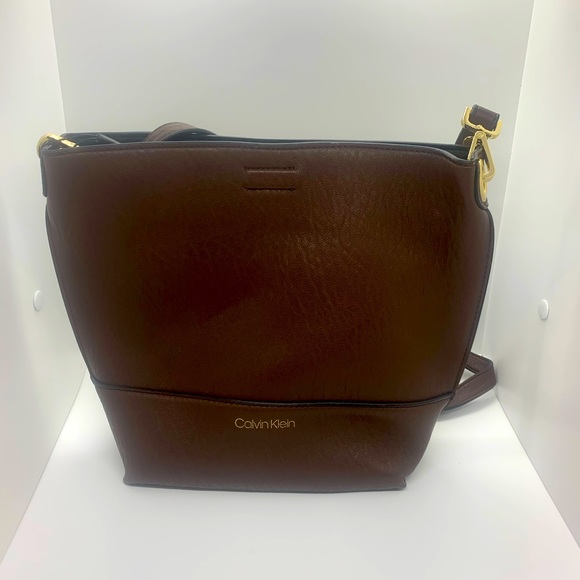 Buy Calvin Klein Brown Monogram Logo Hardware Bucket Bag  CALVIN KLEIN bucket bag